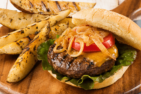 Homemade Beef Burgers with Caramelised Onions and Potato Wedges